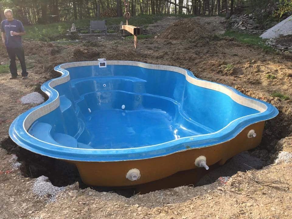 Excavation and hole preparation for a fiberglass pool installation