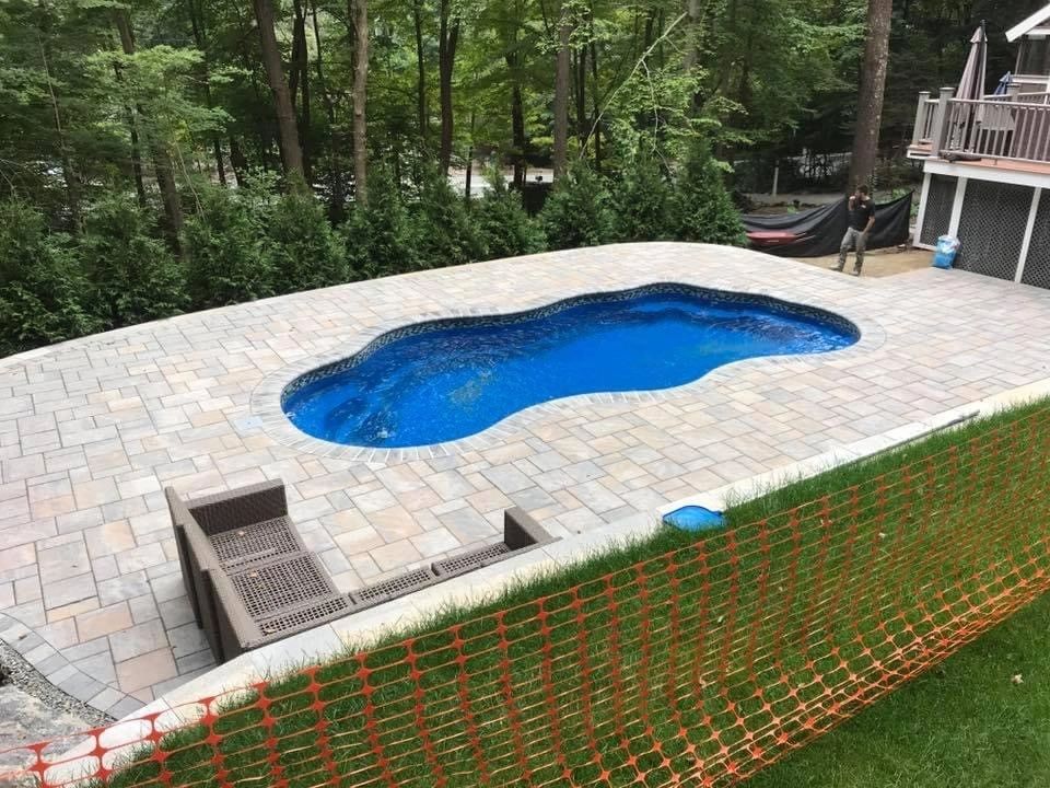 North East Pool Distributors delivery truck carrying pool equipment