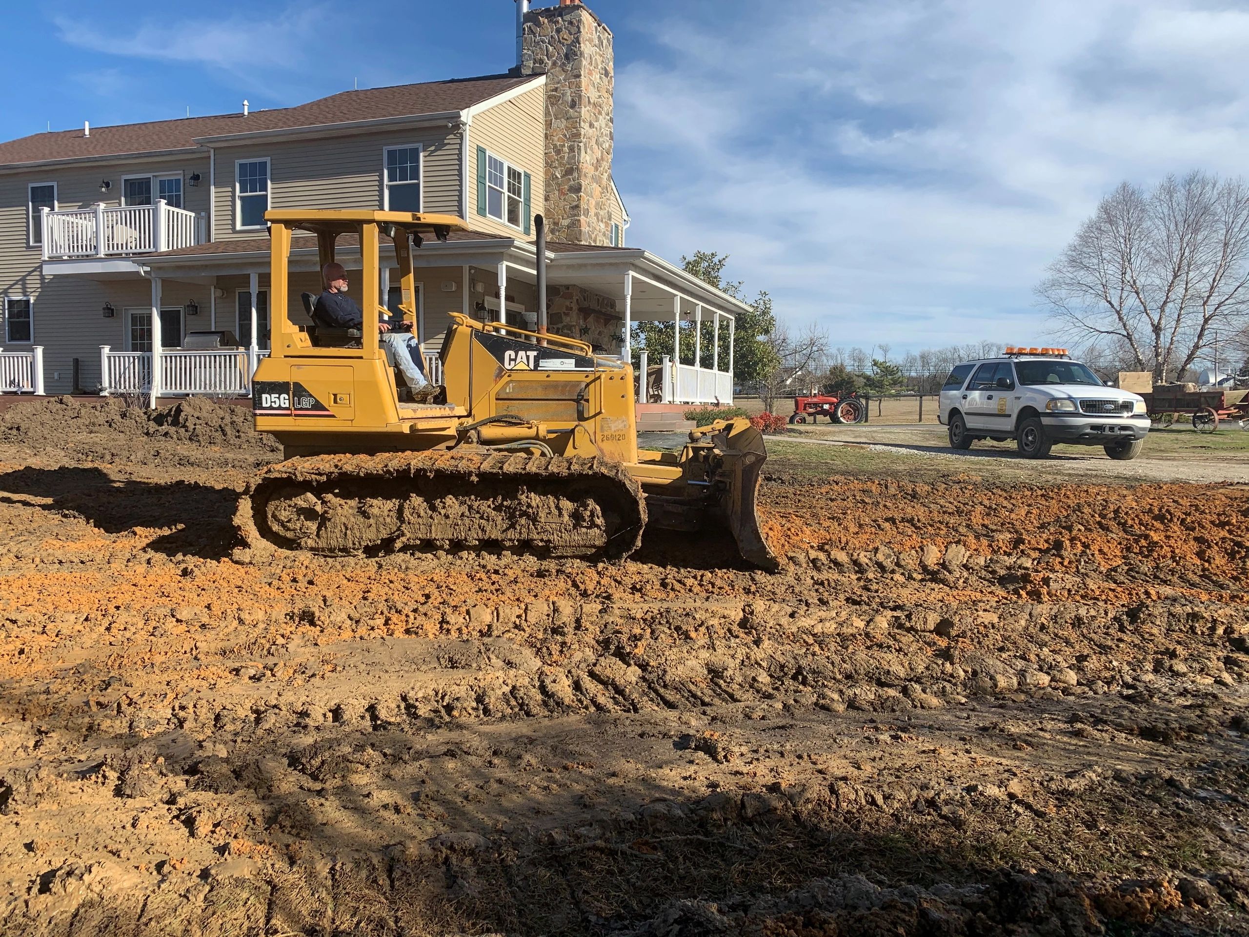 CAT D5G bulldozer on a land development site