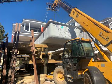 Concrete delivery during pool and deck construction